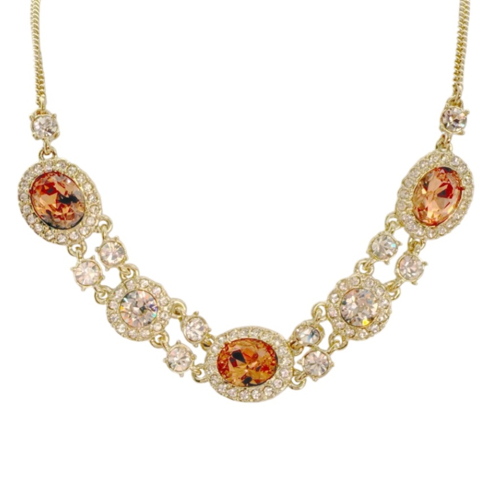 Givenchy Elegant Amber tone gold and necklace.